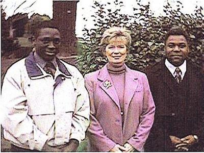 (L-R)  Jim Lyons Sr., Linda Lee Cadwell, Joe LeGrand at Bruce and Brandon Lee's grave site.